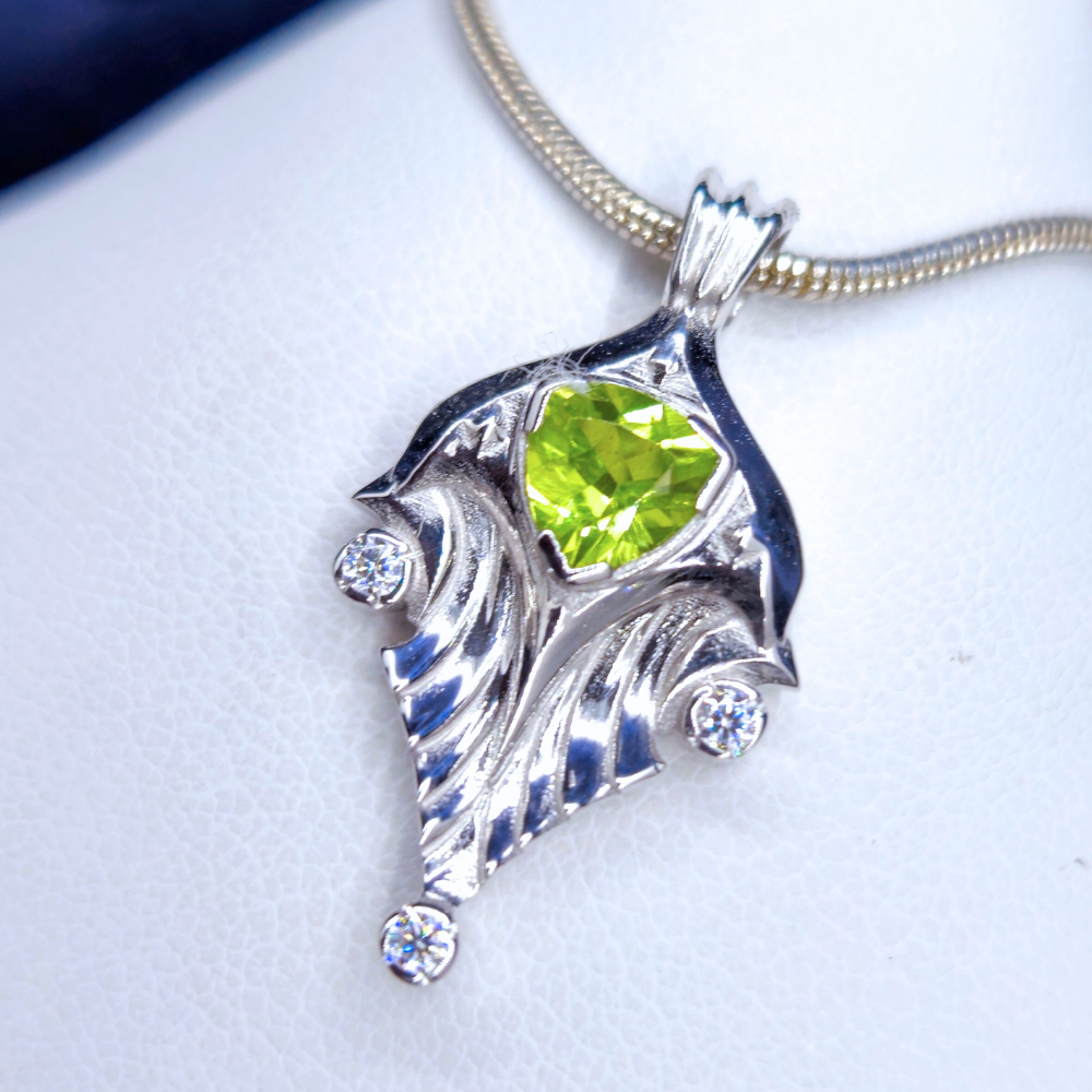 "Stingray" Peridot and topaz