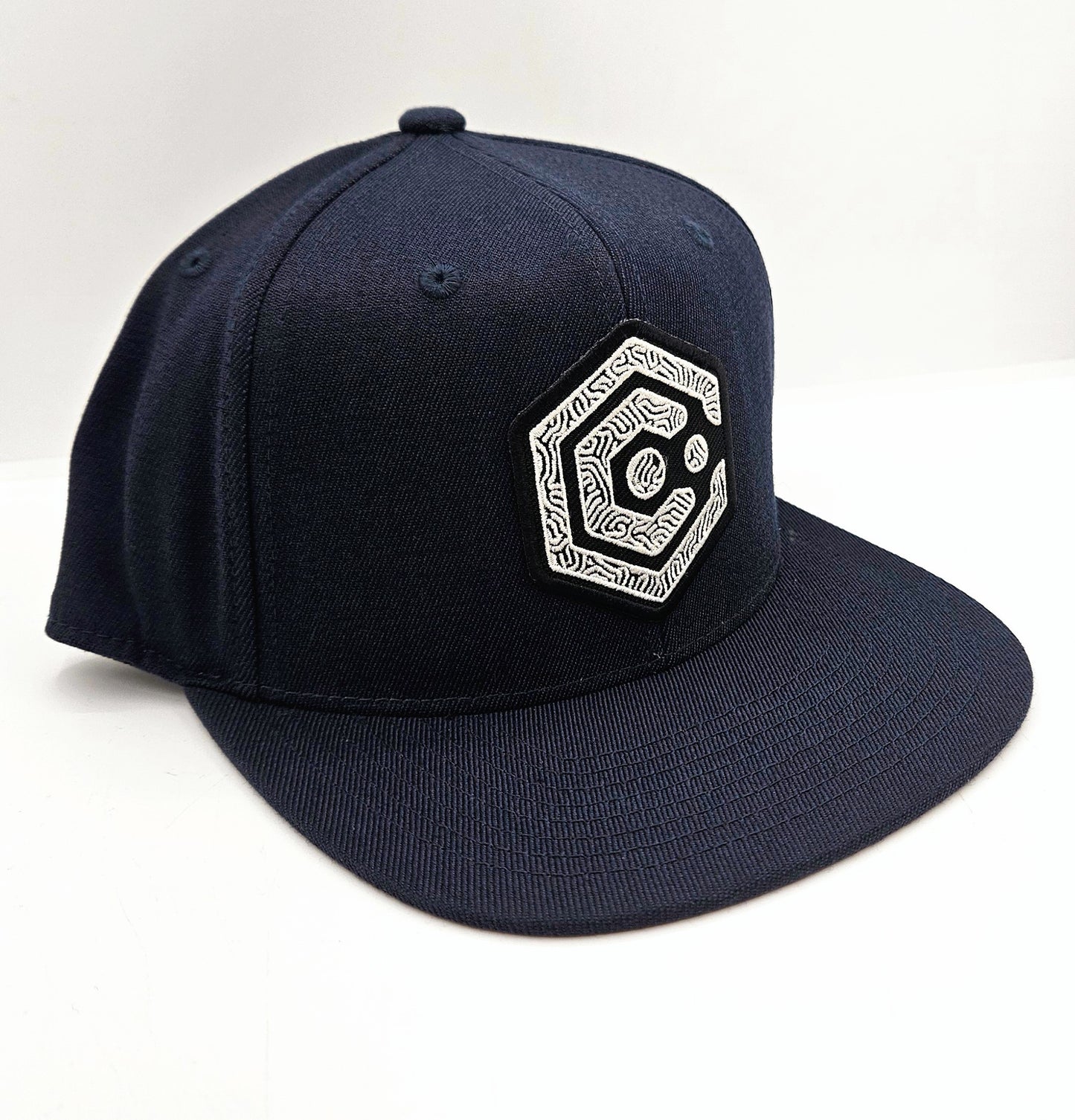 Navy Snapback Hat with Black & White Thumbprint Patch