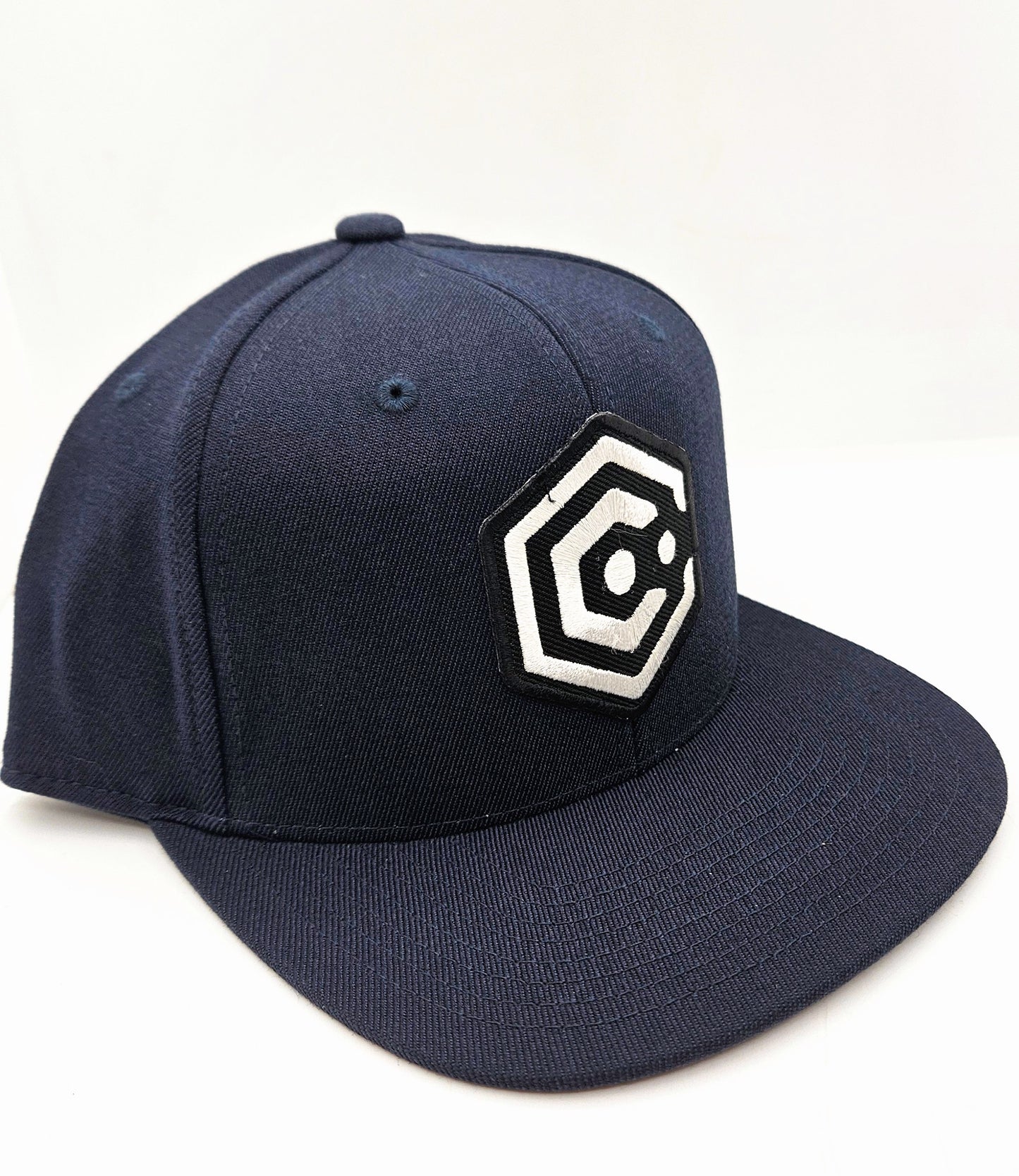 Navy Snapback Hat with Black & White Patch