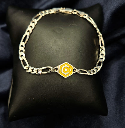 Sterling Silver Figaro Chain Bracelet With Yellow Catalyst Tag