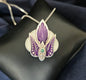 Purple & White Orchid Pendant With Faceted Emerald